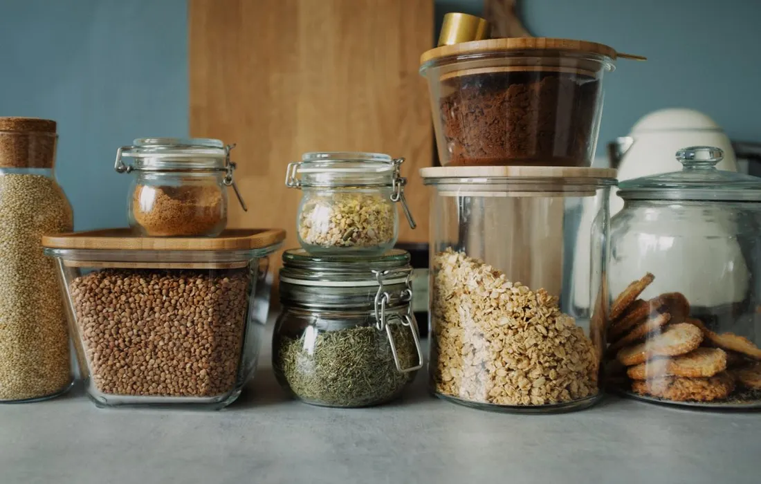 Cookies and other dry foods stored in glass jars.