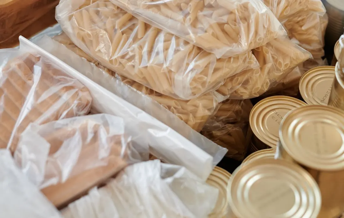 Packaged groceries and bottled water gathered together.