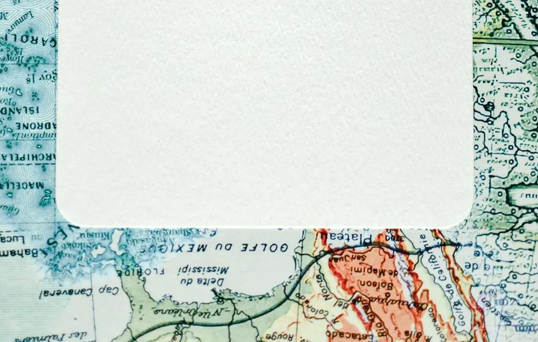 A blank sheet of paper on a geographical map.