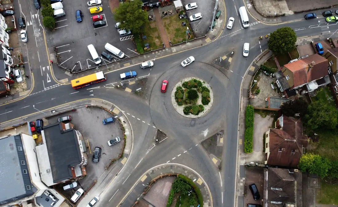 An aerial view of a roundabout and road traffic in Luton.